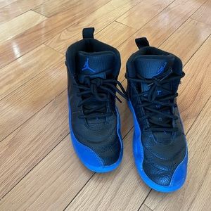 Authentic Blue and black Jordan’s . Barely worn still in great condition 💙🖤